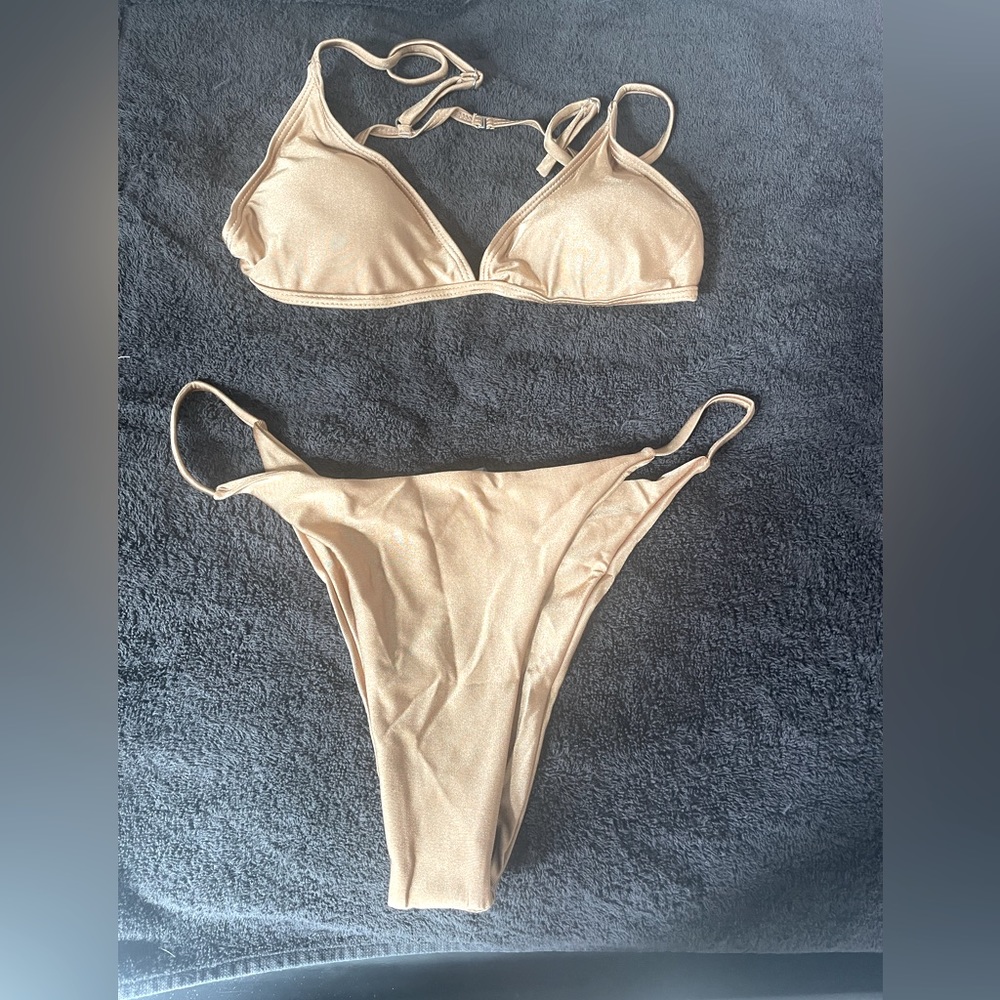 Cream colored suit.